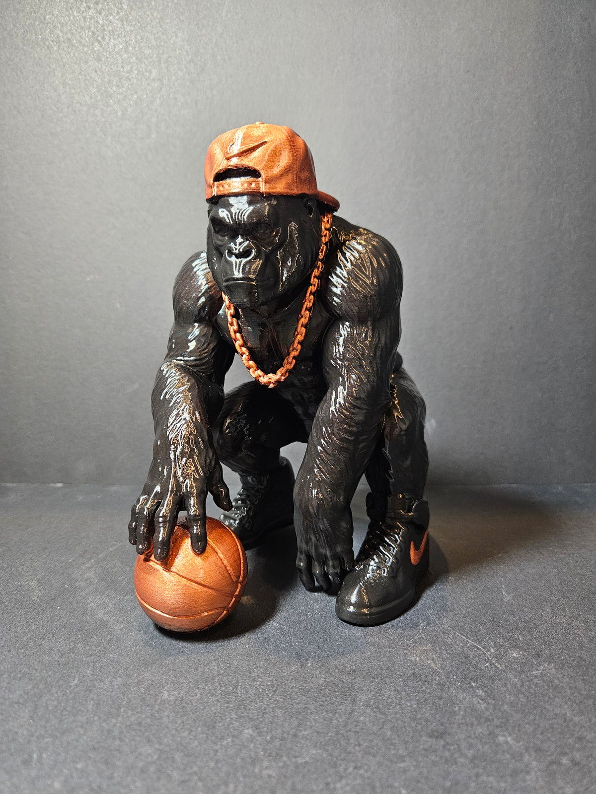 **Courtside King – 22cm Basketball Gorilla Sculpture | $55**