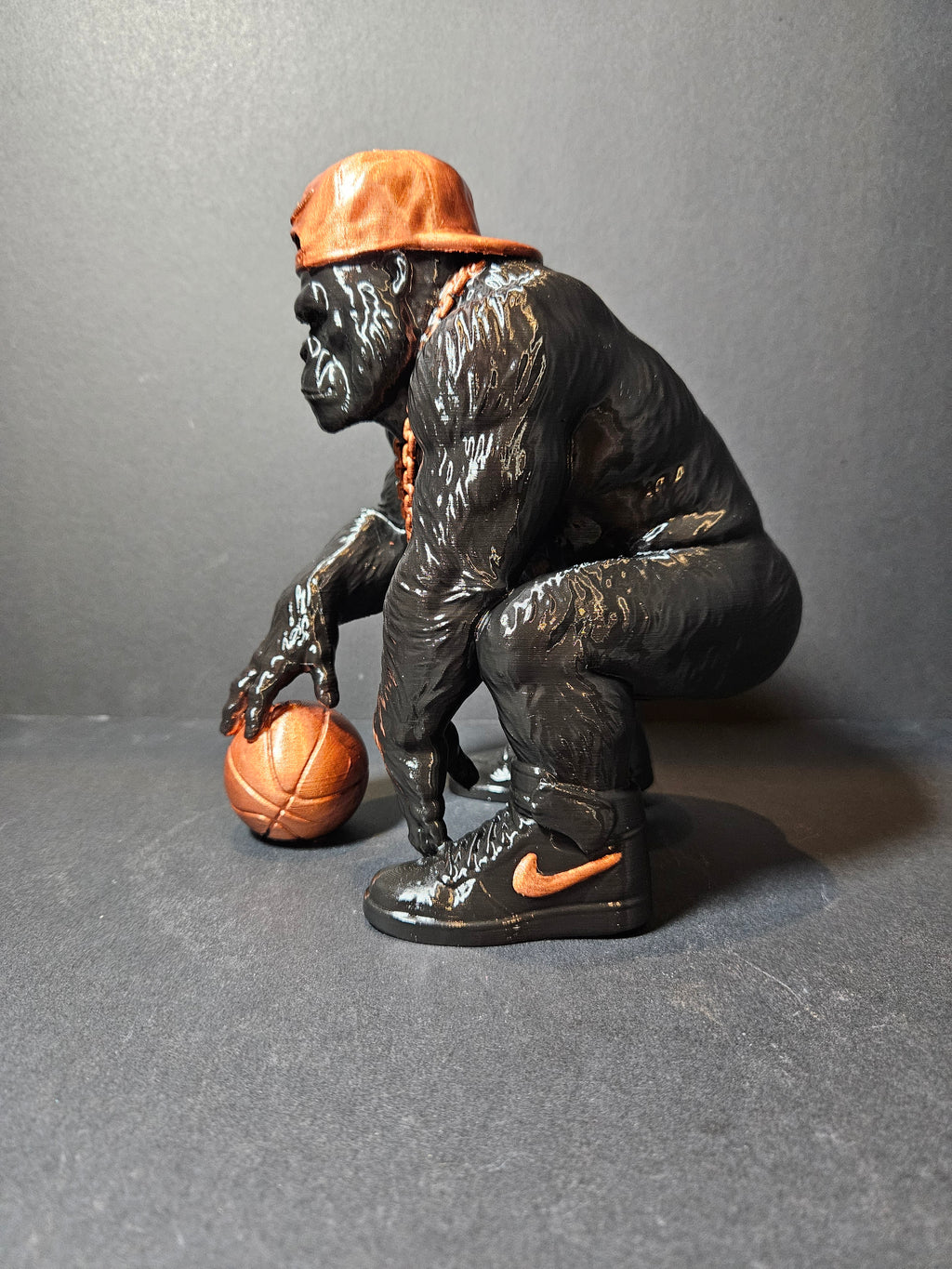**Courtside King – 22cm Basketball Gorilla Sculpture | $55**