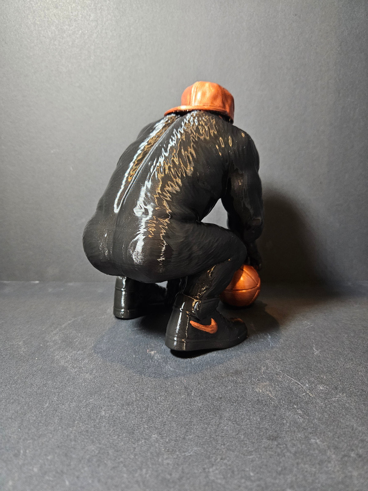 **Courtside King – 22cm Basketball Gorilla Sculpture | $55**