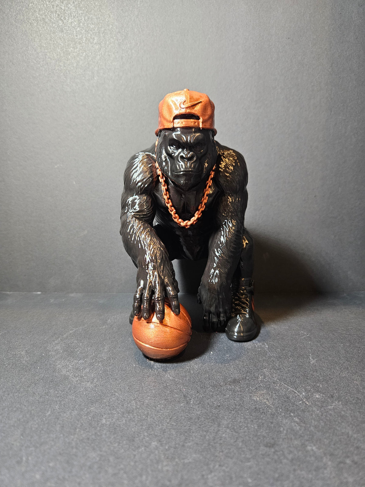 **Courtside King – 22cm Basketball Gorilla Sculpture | $55**