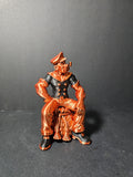 # Heading  Designer Popeye Sculpture – 18cm | Black & Copper Silk | $55