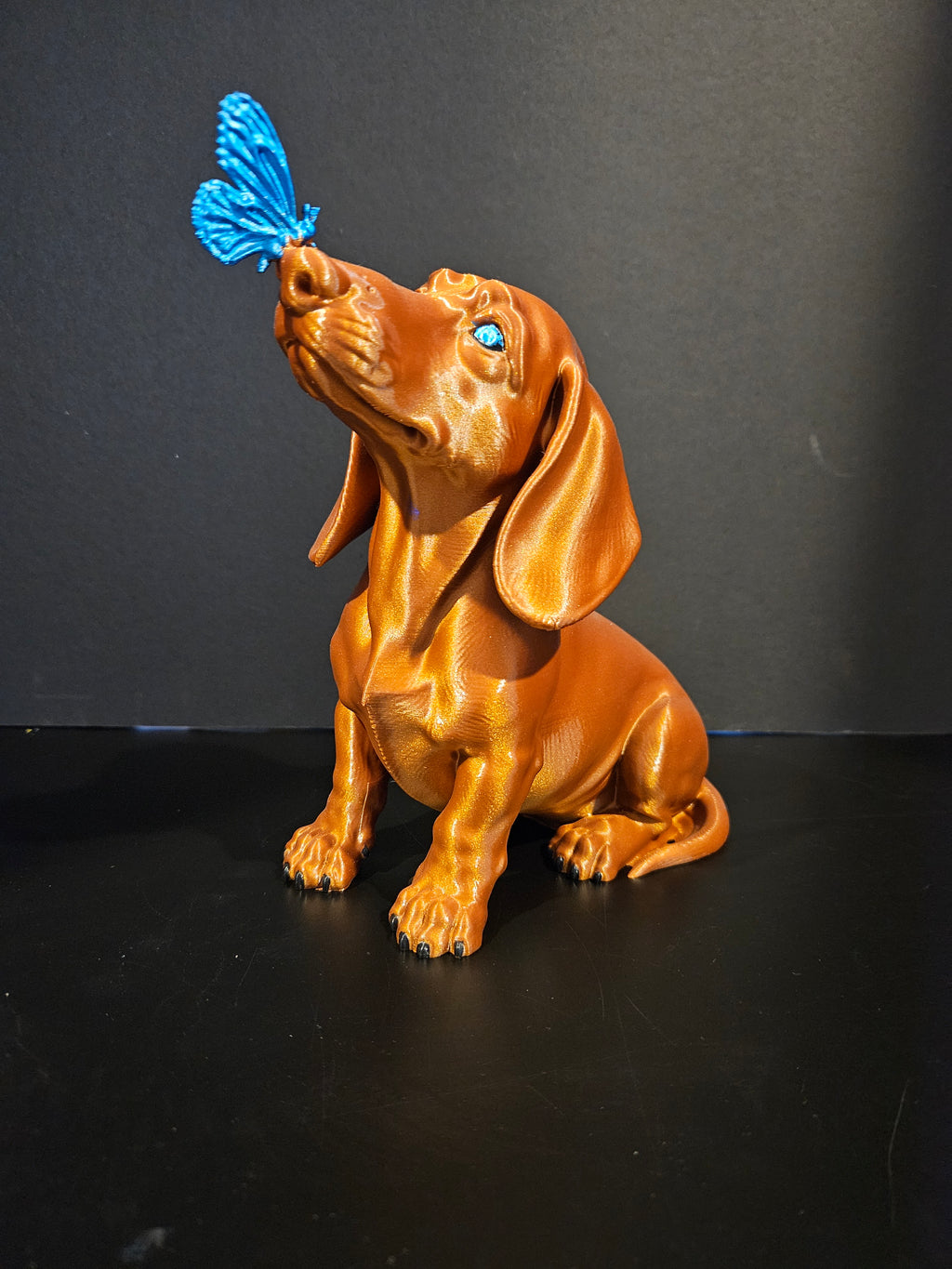 Butterfly Kisses – Dachshund Sculpture