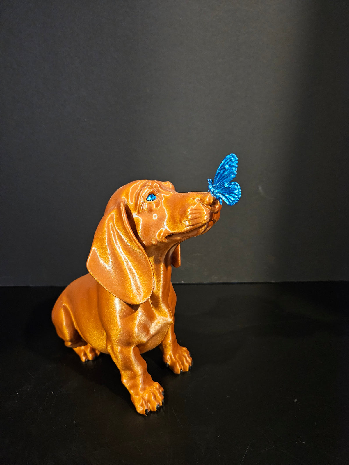 Butterfly Kisses – Dachshund Sculpture