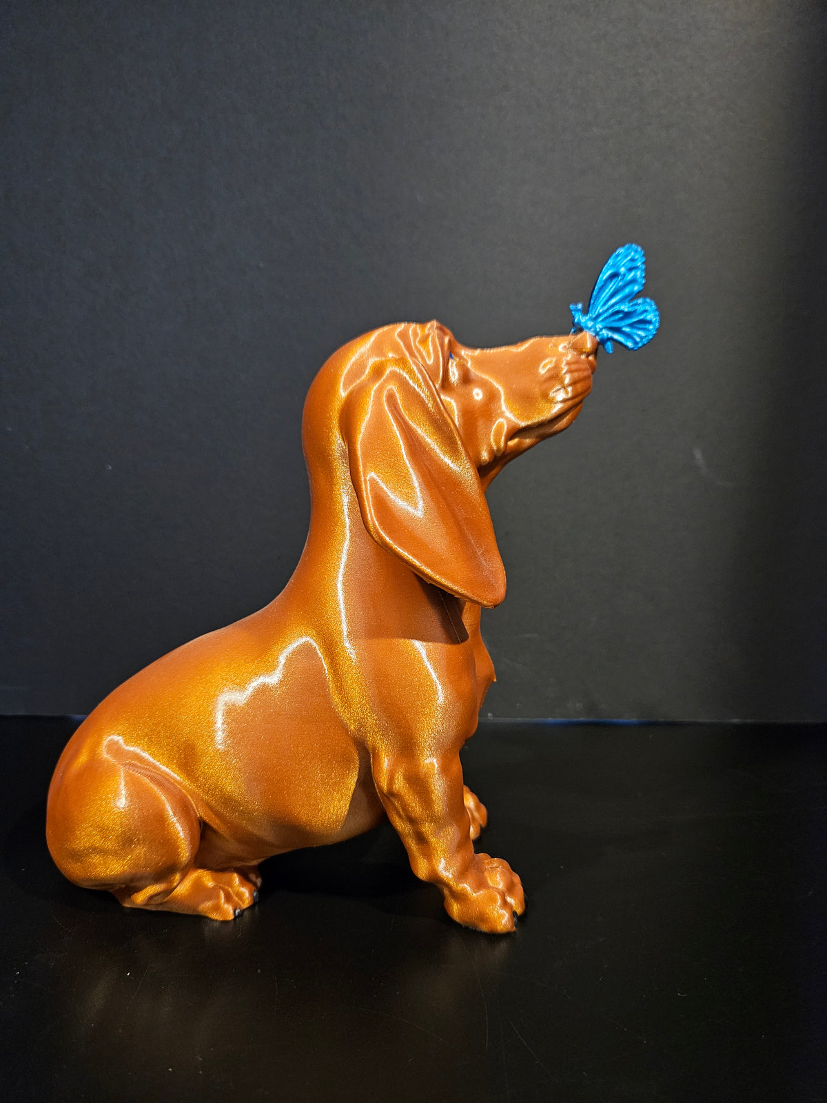 Butterfly Kisses – Dachshund Sculpture