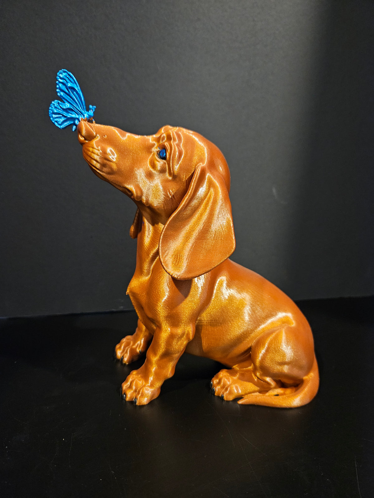 Butterfly Kisses – Dachshund Sculpture