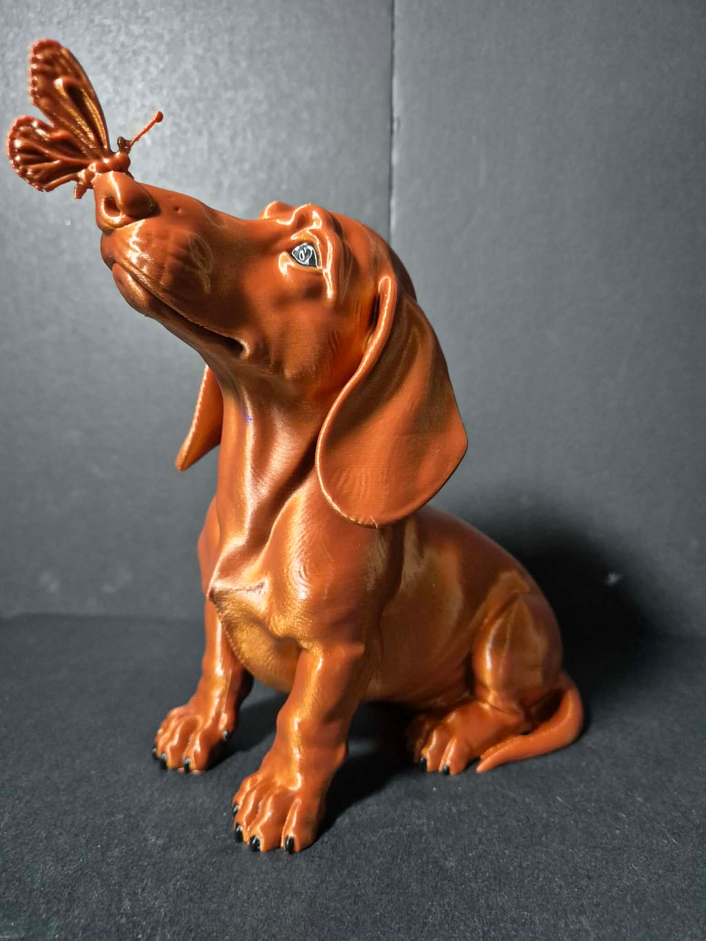 Butterfly Kiss Dachshund Sculpture – 20cm