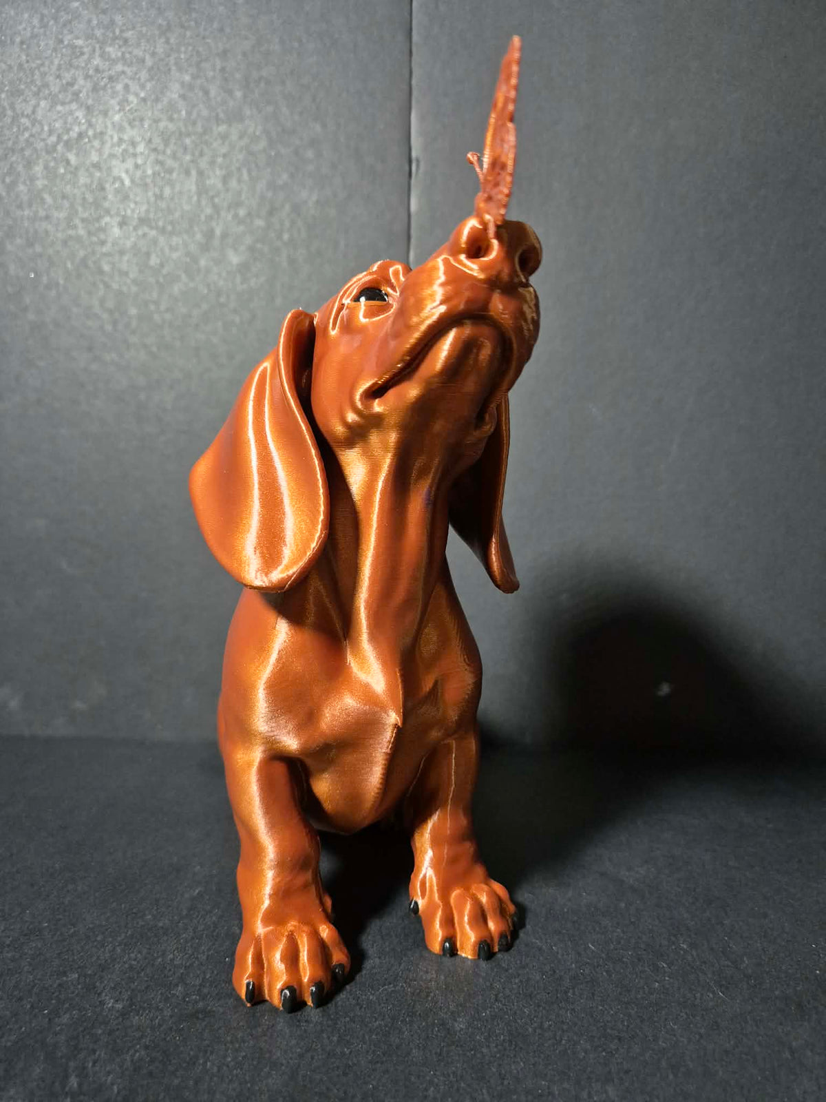 Butterfly Kiss Dachshund Sculpture – 20cm