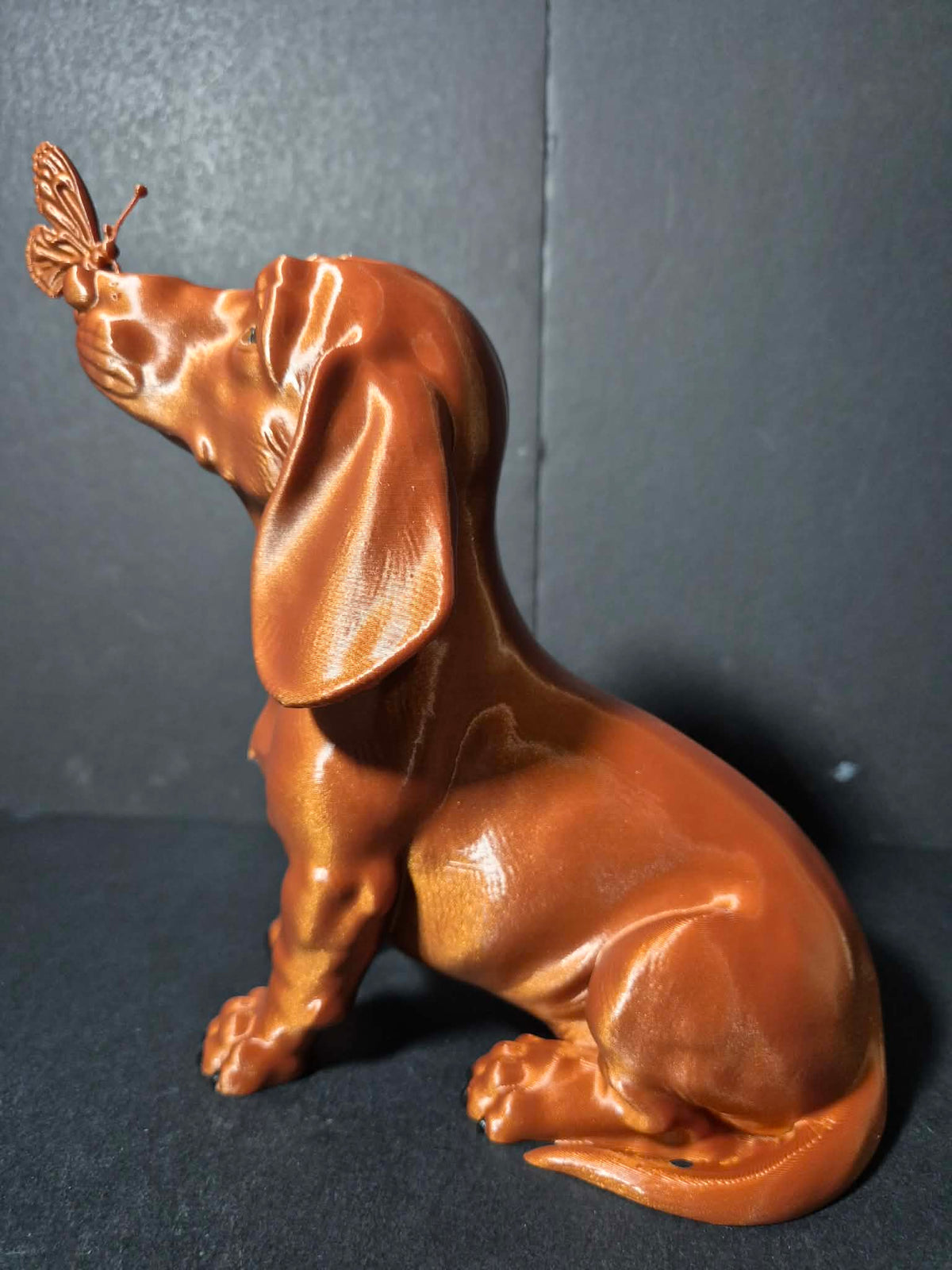 Butterfly Kiss Dachshund Sculpture – 20cm