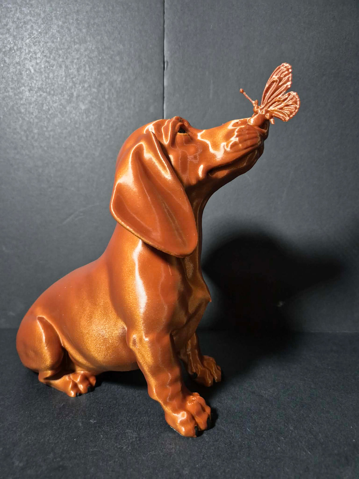 Butterfly Kiss Dachshund Sculpture – 20cm